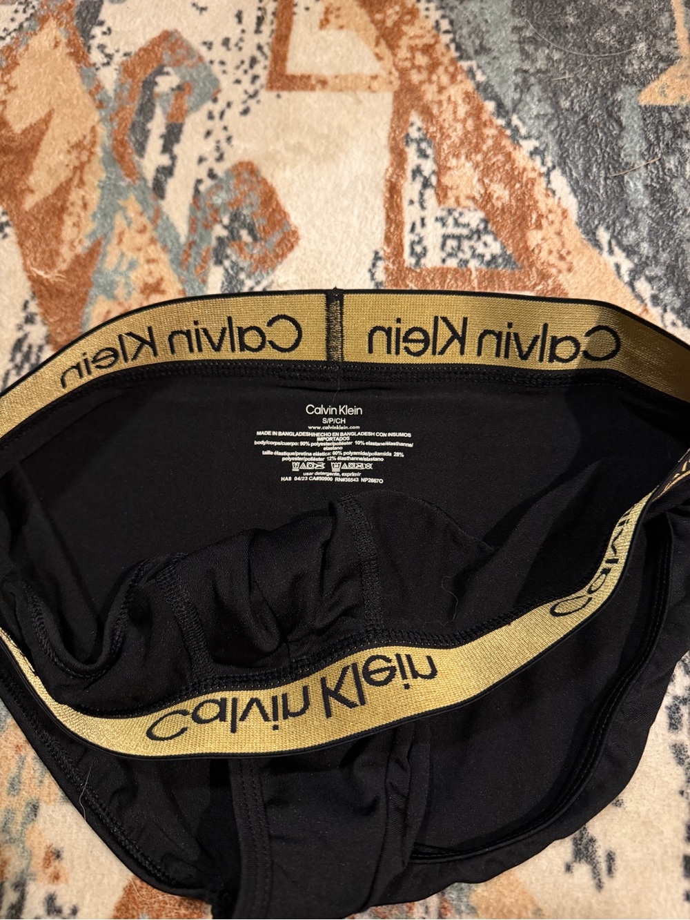 Calvin Klein Black Briefs with Gold Logo Waistband - Picture 2 of 3
